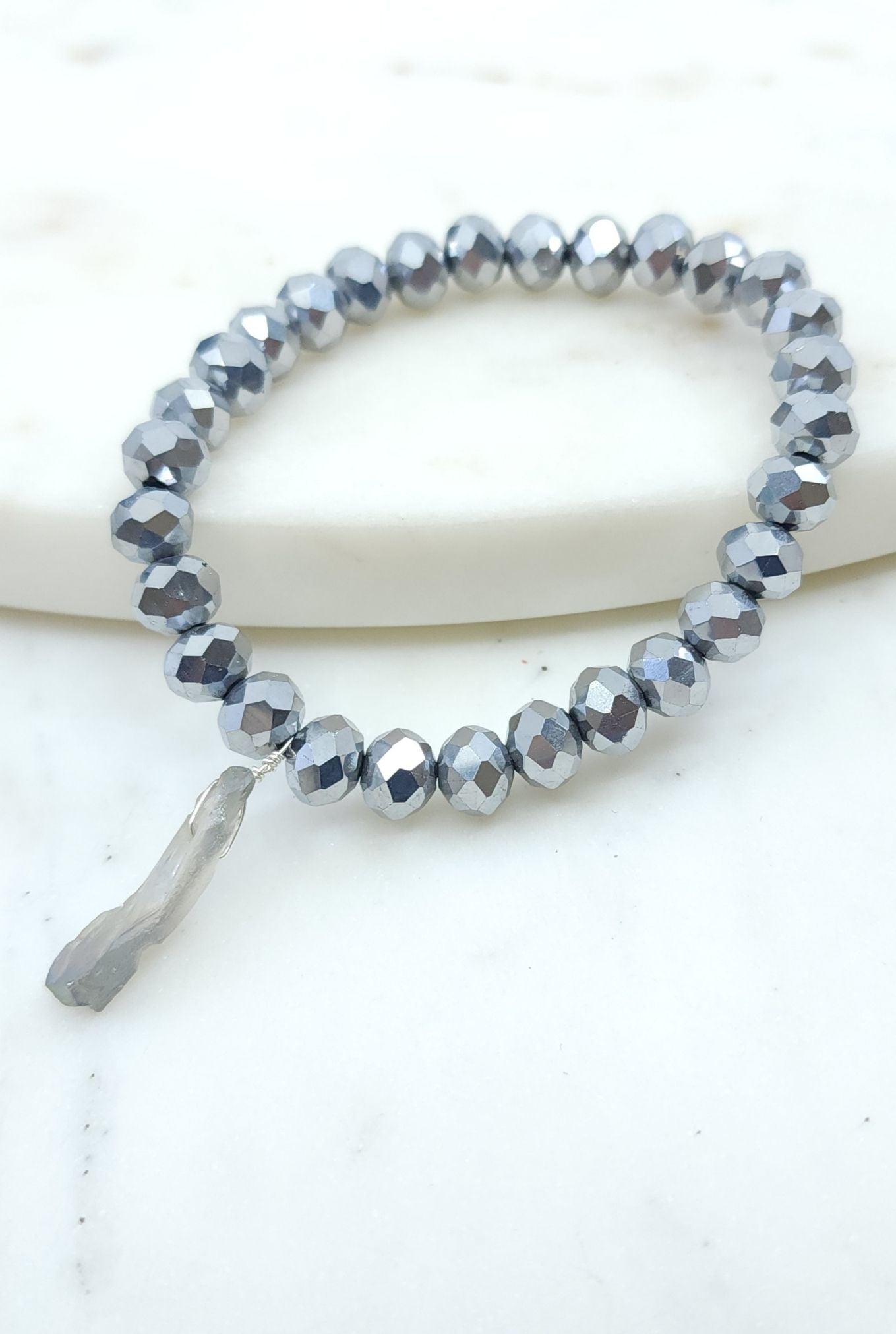 Disco Silberarmband mit grauem Titan-Quarzkristall
