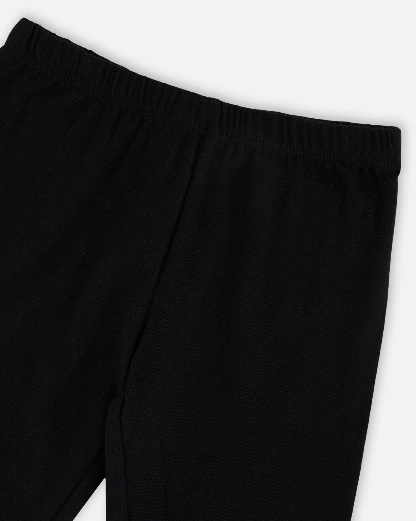 Bio-Baumwoll-Jersey Capri Schwarz mit Knie-Folienherzdruck
