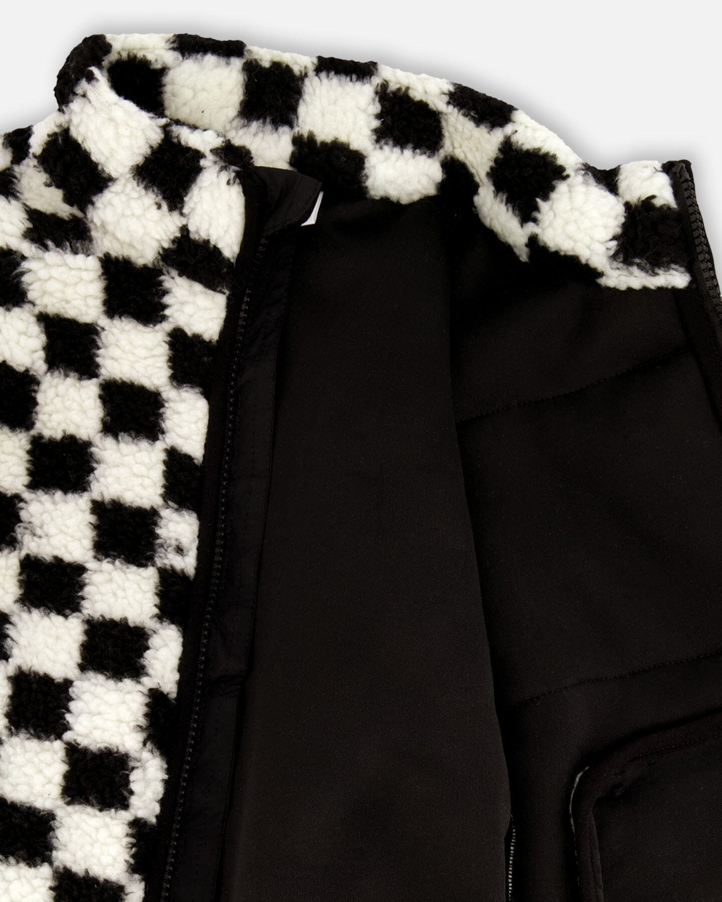 Sherpajacke Schwarz-Karo
