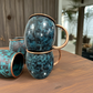 Set of Two Copper Barrel Mugs, Hammered and Stained Blue Patina