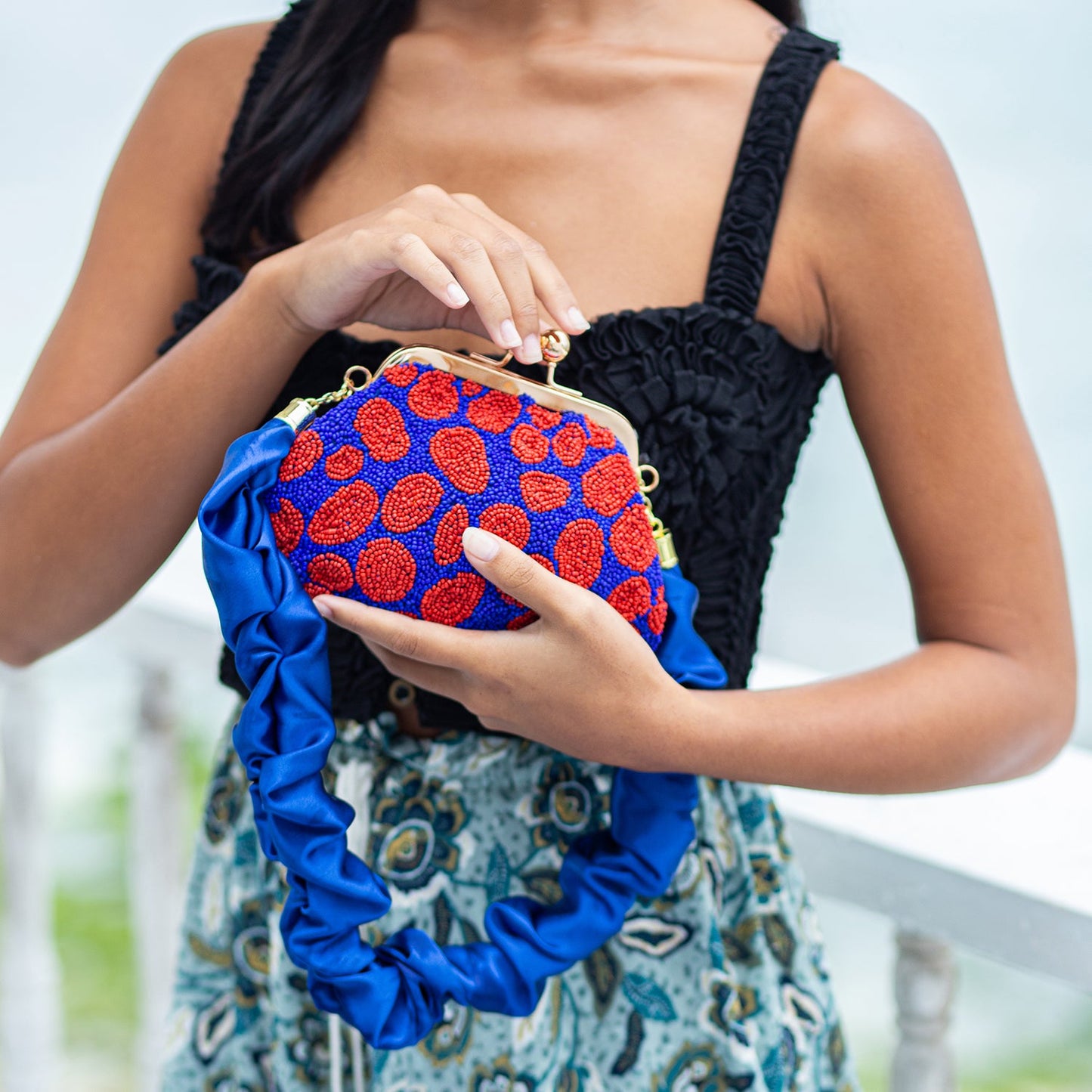 The Arnoldi Mandy Hand-beaded Clutch, in Savoy Blue & Red