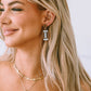Brown Glittering Football Pendant Earrings