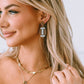 Brown Glittering Football Pendant Earrings