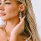 Brown Glittering Football Pendant Earrings