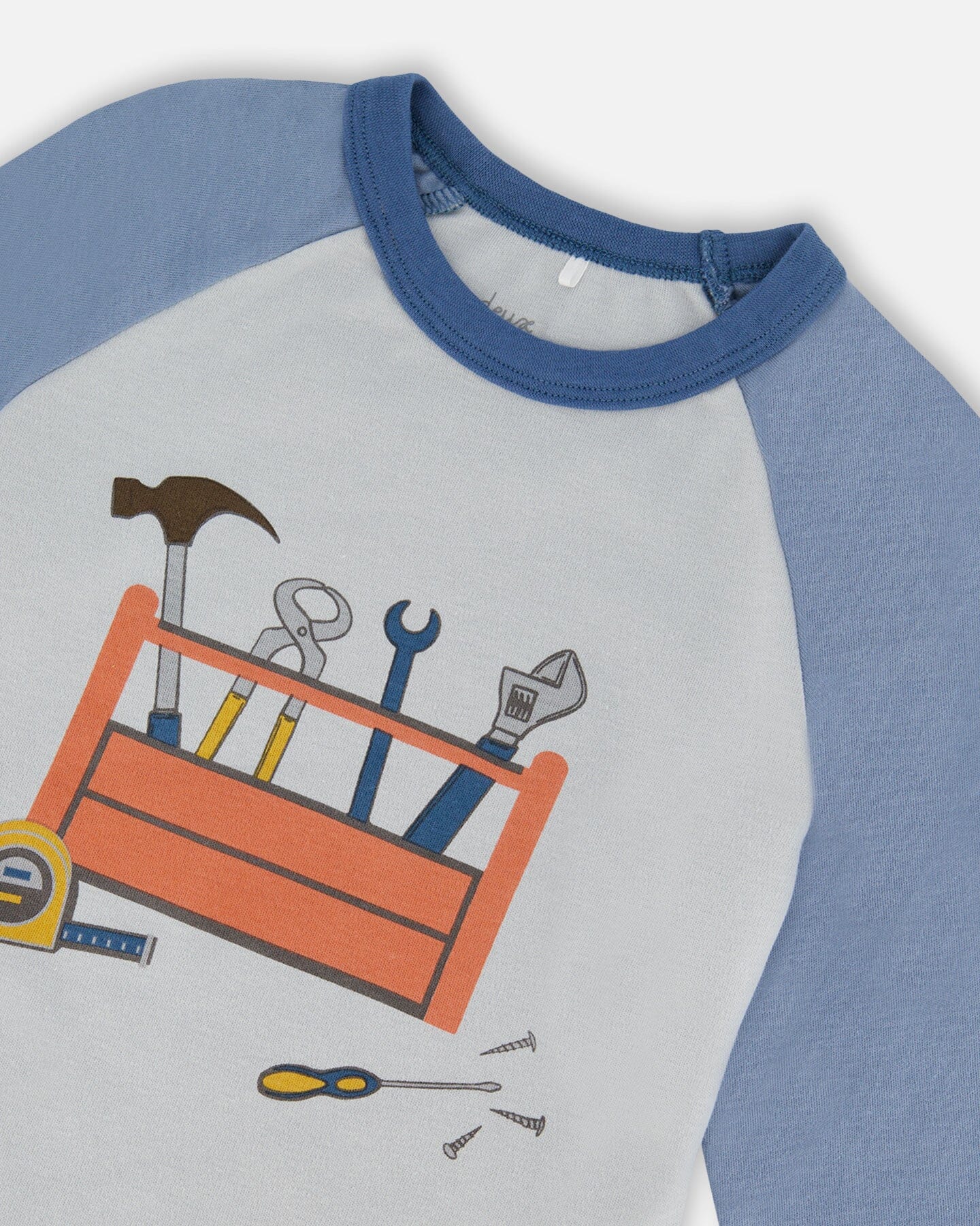 Organic Cotton Long Sleeve Top And Pants Two-Piece Pajama Set Tools On Bluish Gray Background