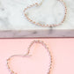 Wrapped Around the Heart Earring in Silver with Rose Gold Wrap