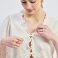 Relaxed Fit Top With Ruffles and Front-Ties in Cream