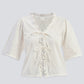 Relaxed Fit Top With Ruffles and Front-Ties in Cream