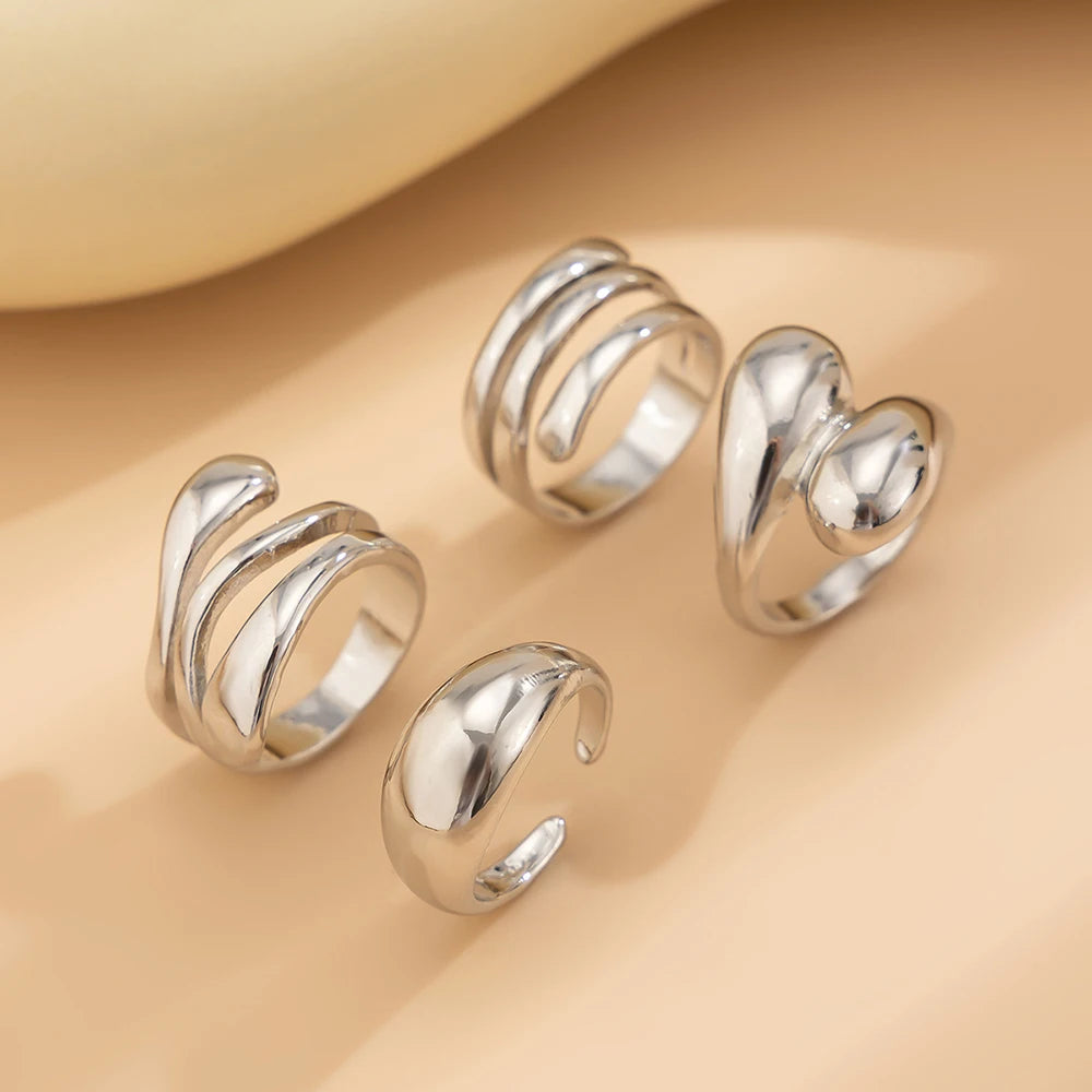 Fashion 4er-Set unregelmäßige Ringe für Frauen Punk-Persönlichkeit Gold-Silber Farbe Offene Ringe Party Täglich Weiblicher Schmuck