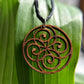 Spiral Circle Pendant in wood on leather cord